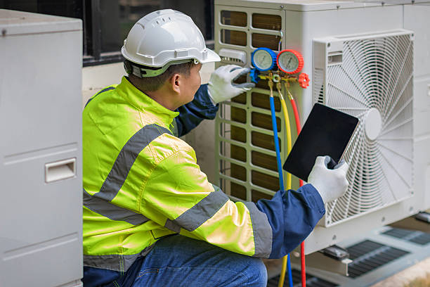 Professional Hvac technician working in Uxbridge, MA